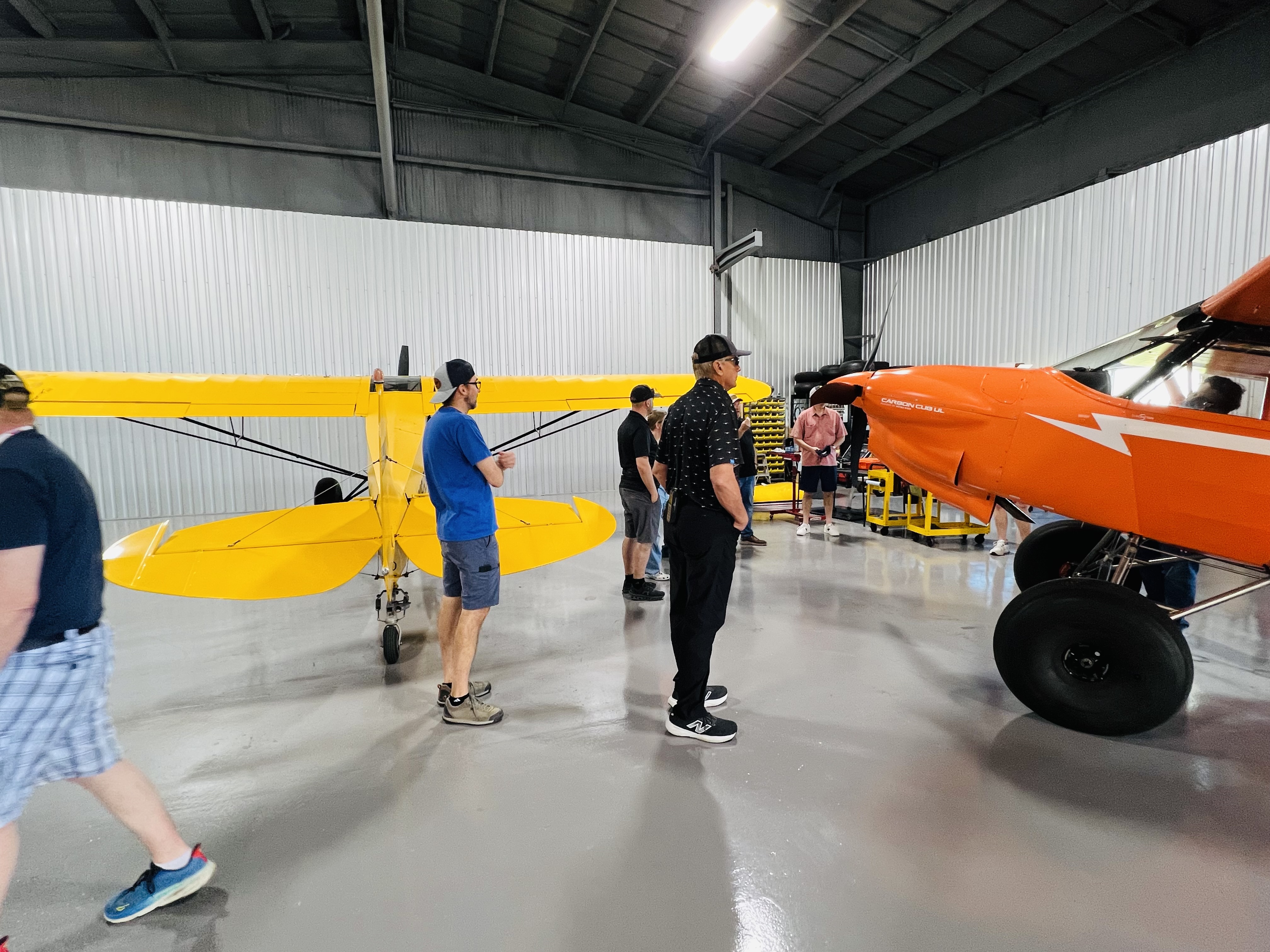 Members examining aircraft up close